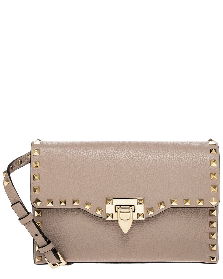 Shop Valentino Rockstud Small Grainy Leather Crossbody In Pink