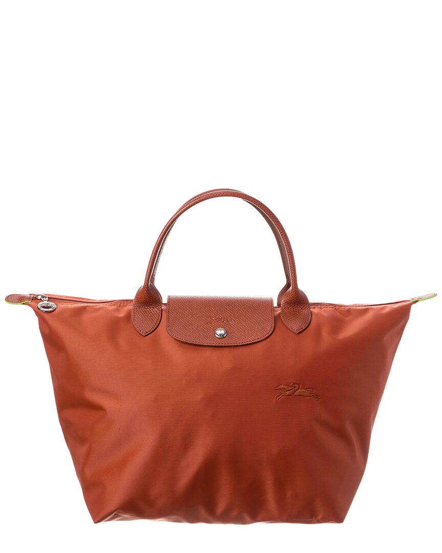 Shop Longchamp Le Pliage Green Medium Canvas Short Handle Handbag In Red