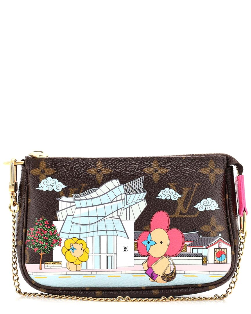 Click to view more detailed imagery on our partner's website Pre-owned Louis Vuitton Pochette Accessories Limited Edition Vivienne Xmas Monogram Canvas Mini (authentic Pre
