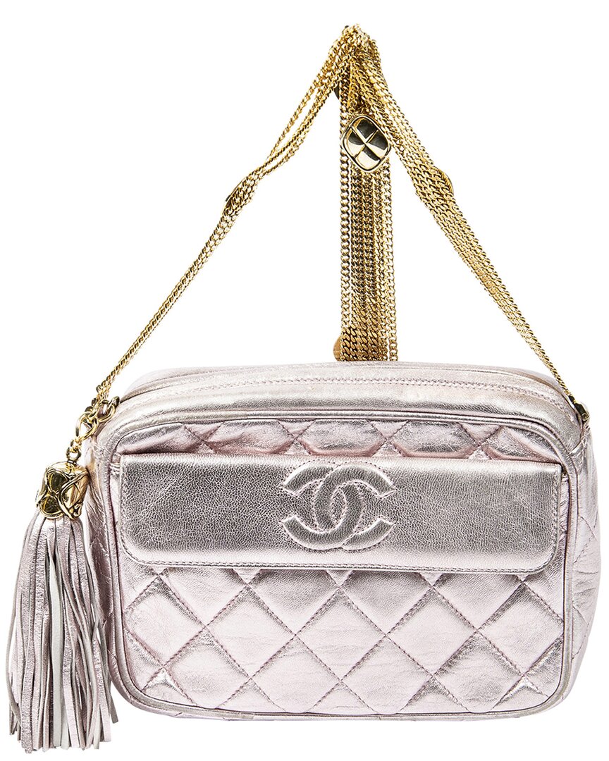Click to view more detailed imagery on our partner's website Pre-owned Chanel Limited Edition Pink Lambskin Leather 1989 Rare Quilted Small Metallic Tassel Chain Bag (aut