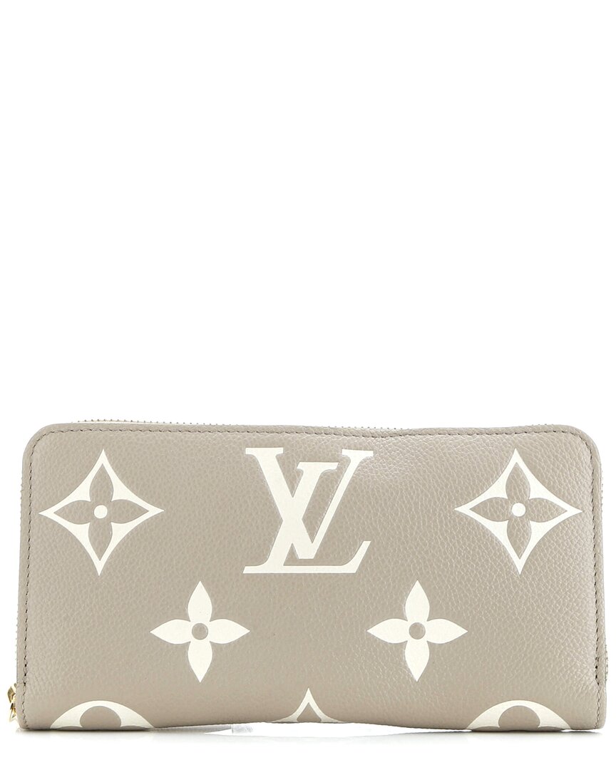 Click to view more detailed imagery on our partner's website Pre-owned Louis Vuitton Beige Monogram Empreinte Giant Zippy Wallet Bicolor (authentic Pre-loved)