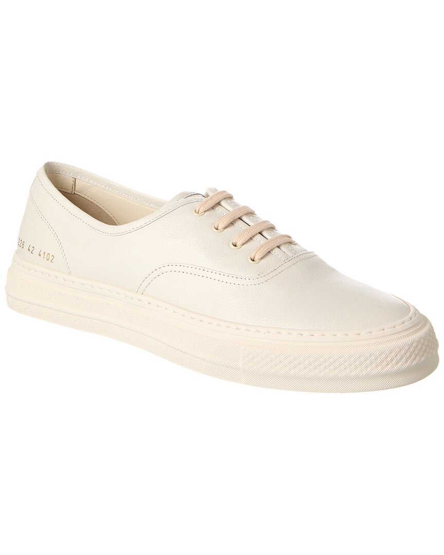 Shop Common Projects Four Hole Leather Sneaker In White