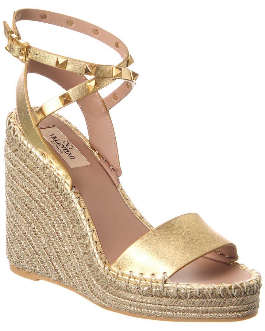 Shop Valentino Rockstud 125 Leather Wedge Sandal In Gold