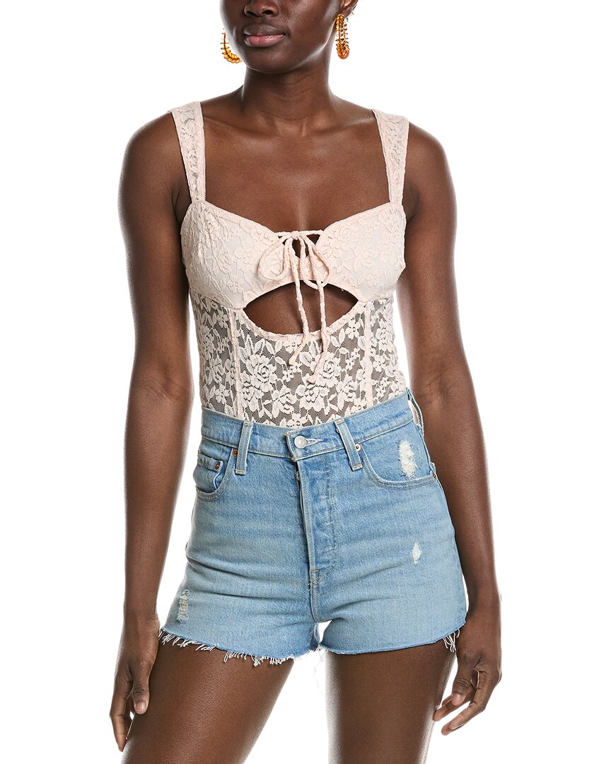 Shop Free People Strike A Pose Bodysuit In Pink