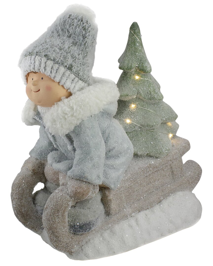Northern Lights Northlight 15in Beige And Green Lighted Boy On A Sled Christmas Decoration In Green