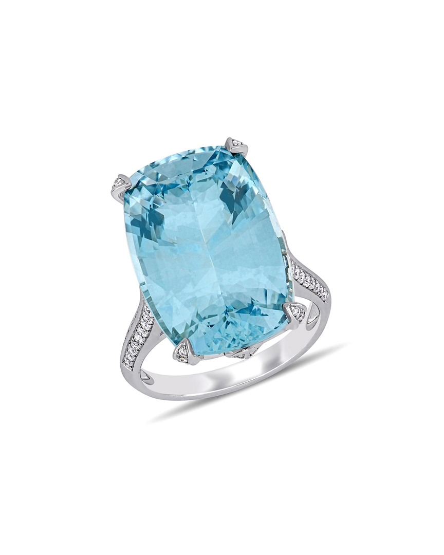 Image of K . ct. tw. Diamond & Sky Blue Topaz Ring